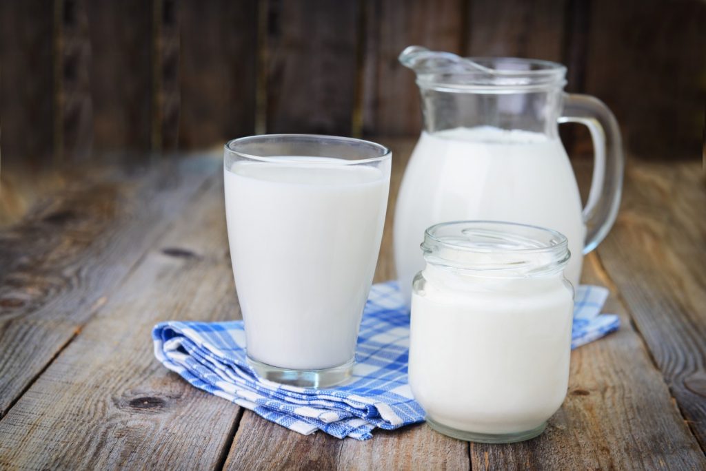 Pitcher and glasses of milk