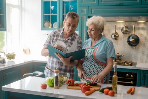 Senior couple cooking a healthy meal