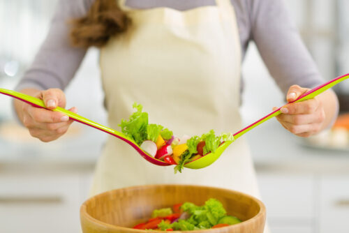 Mixing a salad